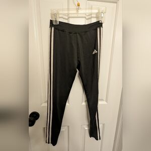 Two pair Girls Adidas track leggings, one black w/white and one black w/colors